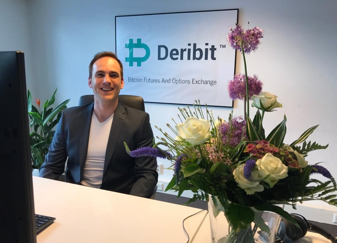 We just opened our office in Amsterdam (The Netherlands). John looks happy  with his flowers! 😎 #Flowers #bitcoin