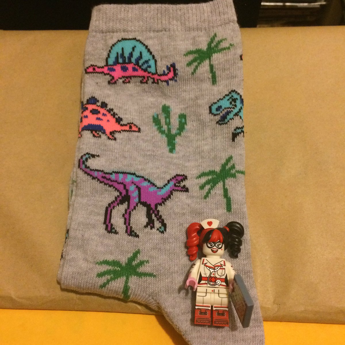 JadelynS's tweet image. What is everyone buying with their last paper £5 note? I bought dinosaur socks and Lego with mine. 😎 #fivepoundnote