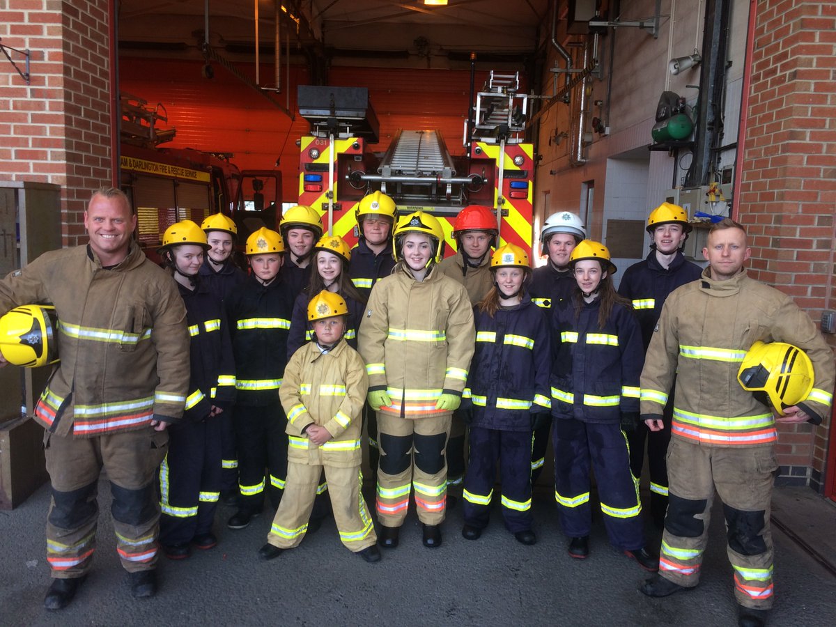 CM Greenwood and CM Corfield welcome one of the new apprentices to Peterlee Young Firefighters drill night.