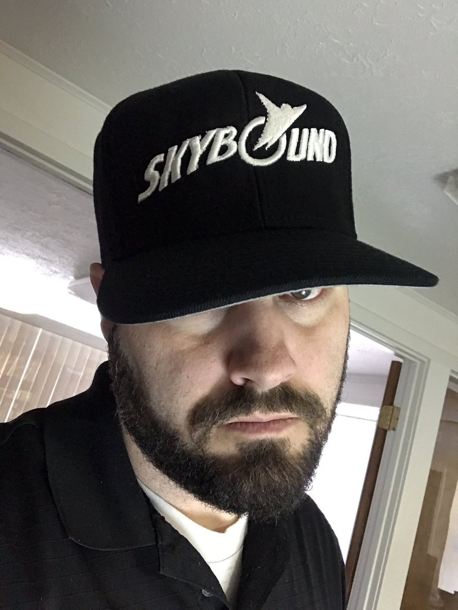 RyanOttley's tweet photo. I got a new hat. Guess where I got it? (Don't read the logo, that's cheating). GUESS! I'll give you a hint. Not Marvel. https://t.co/5soopjjhKo