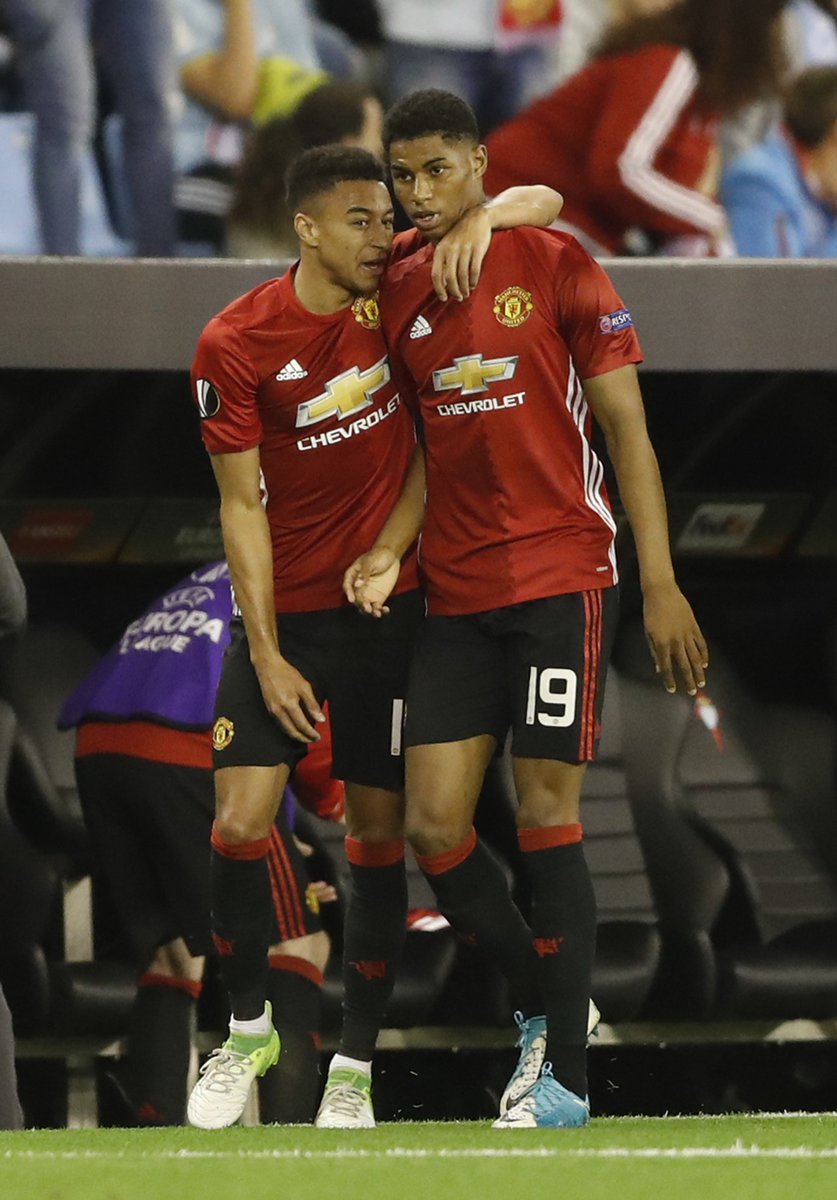 Marcus rashford celebrates with jesse lingard after 