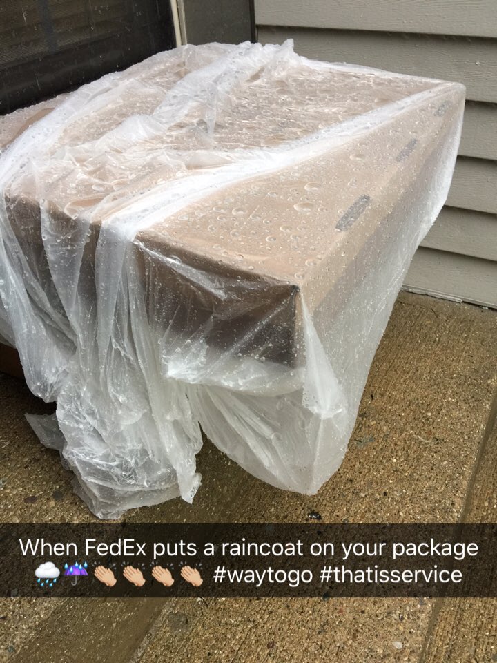 Aliekat's tweet photo. ❤️ my @FedEx driver! Put our package in a bag. Underneath that is the box @USPS left... soaked thru! #fedexwin ☔️🌧👏🏼 #uspsfail @amazon https://t.co/bKWgv3aSuV
