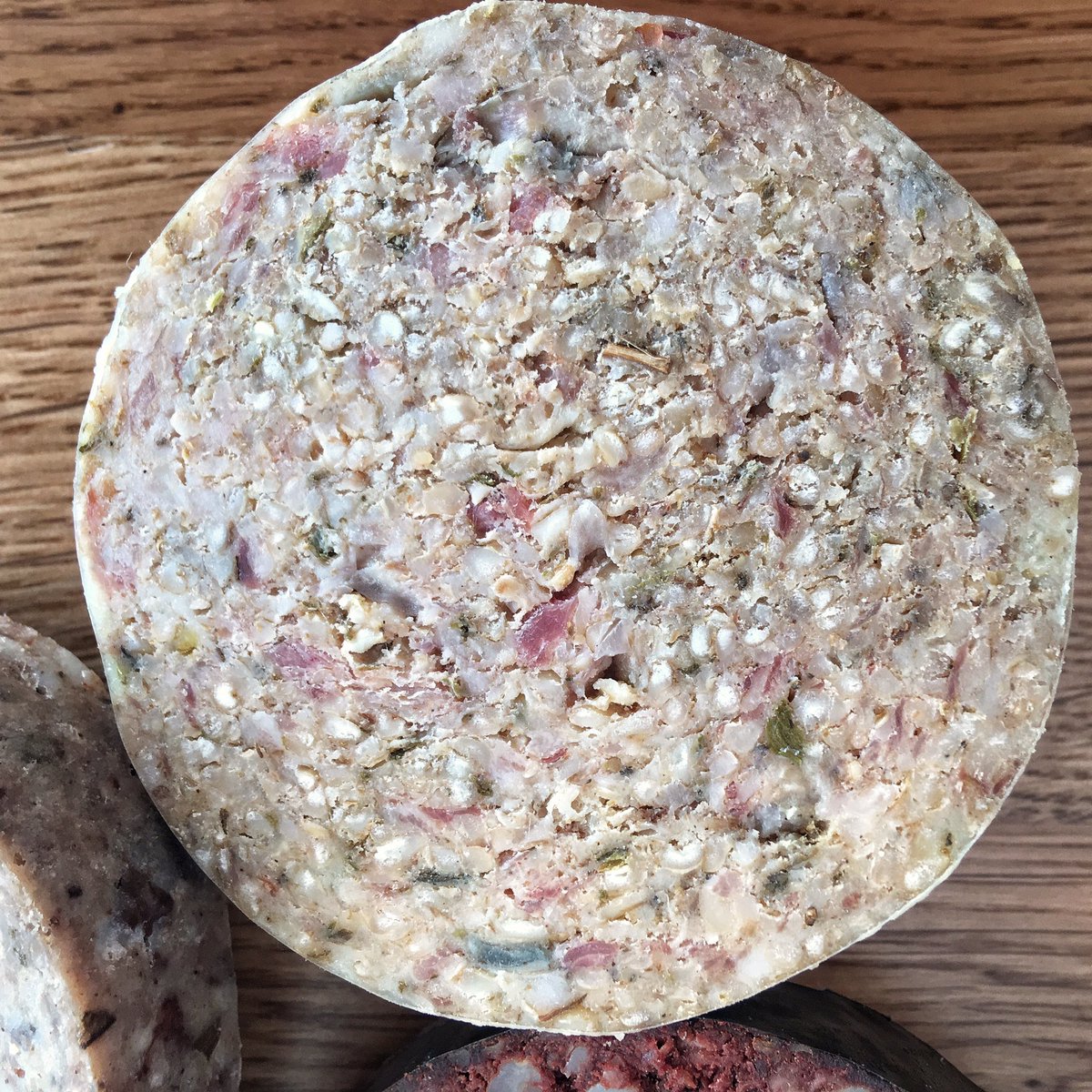 fruitpigcompany's tweet photo. Some white puddings r more equal than others. Ours includes chopped smoked bacon fat, fresh red onion, cumin & oregano. #sumptous-nuss-ness. https://t.co/7jDOZ0esRX