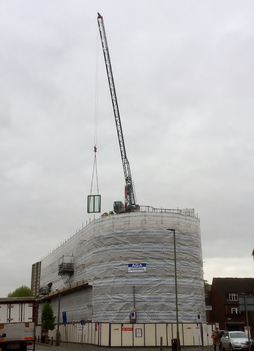 WCraftersltd's tweet photo. Cloudy day here in London but at least the wind keeping low so that we can swing these windows and doors up into position https://t.co/1jrfsDxuGy