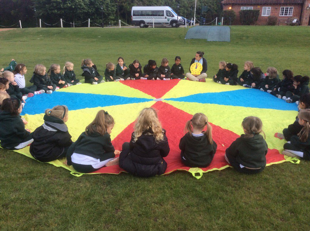 Reception found a great way to learn how to tell the time at Hinchley Wood today! We used our parachute as a clock.