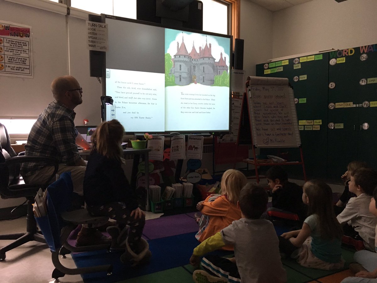 MsRumbleSL's tweet photo. What a nice treat to have our mystery reader scan in their book so we could all see it on the big screen! @syracuselatin https://t.co/ePwChei9kX