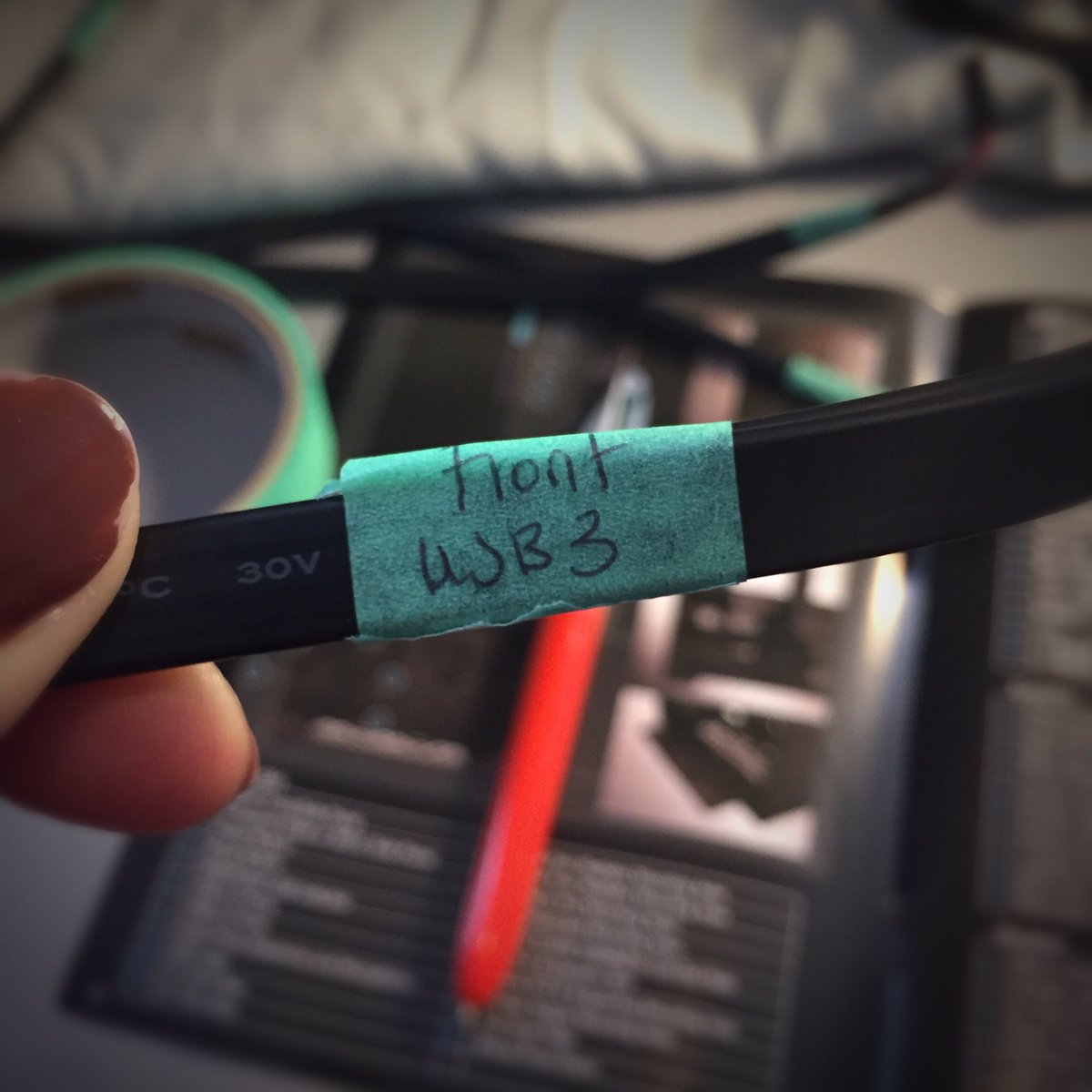Elisabete's tweet photo. Still at it, folks. Pull out the mobo, unplugged the wires and started again. 

But this time, I've labeled ALL the things! 😅🔌🏷 #QuietPanic https://t.co/XVf3hdpr49