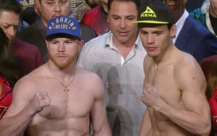 Queensberry's tweet photo. ⚖ @jcchavezjr1: 164lbs
⚖ @Canelo: 164lbs

Both fighters make weight in Vegas. Watch the fight LIVE on BoxNation tomorrow night! https://t.co/ZxO78NyHaZ