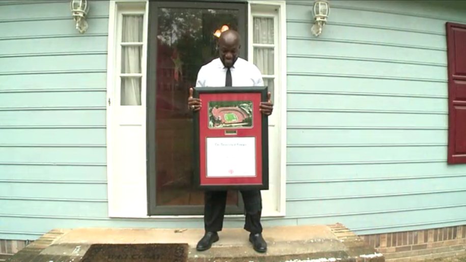 11AliveSports's tweet photo. How this frame, a diploma addressed to "John Doe," and a promise to mom changed @RennieCurran53's life today: https://t.co/6dQ1bhExKm https://t.co/672H7OxheJ