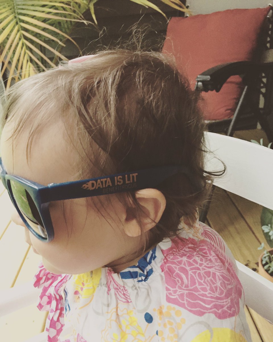 greeves's tweet photo. Norah is very excited about her "Data is Lit" sunglasses I brought home from @benefitfocus #oesuccess week!  Great week!  @BNFTculture https://t.co/u9j8cYkSrK