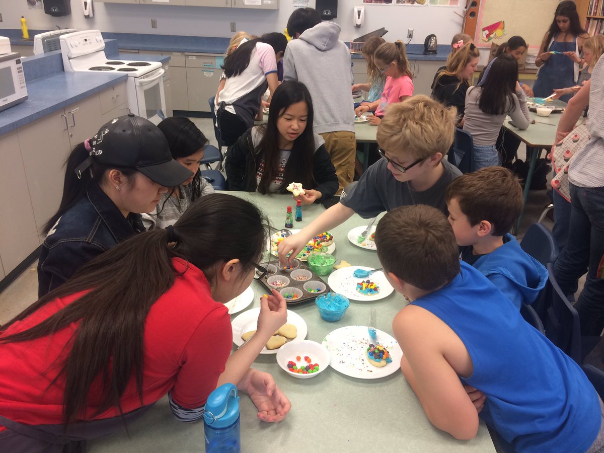 SQE and HSS students making cookies together. Food can bring everyone together! #SD48