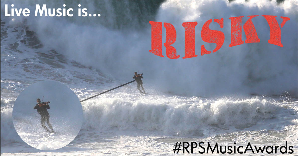 RoyalPhilSoc's tweet photo. Exciting live music making involves taking a few risks - but we're not sure you should try this one at home! #LiveMusicIs #RPSMusicAwards https://t.co/hjOUCXdWJG