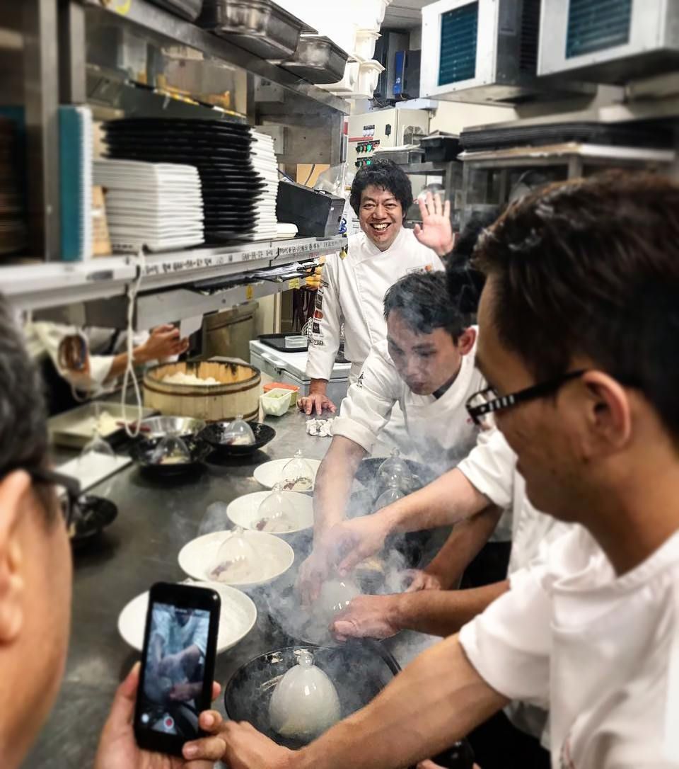 rwsentosa's tweet photo. Celebrity Chef Hal Yamashita is always camera ready, even amidst the busy kitchen at the Japan Gourmet in Syun! #rwsdining https://t.co/sLLcG1HnuK