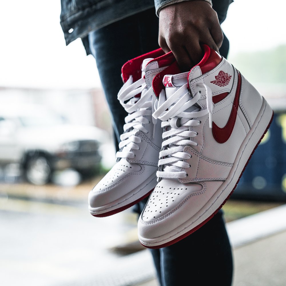 jordan 1 metallic red on feet