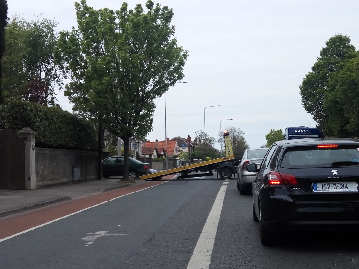 SiomhaM's tweet photo. @GardaTraffic Ballymun road now. Blocking the whole road. Surely this is not legal?? https://t.co/jw7BIssAI4