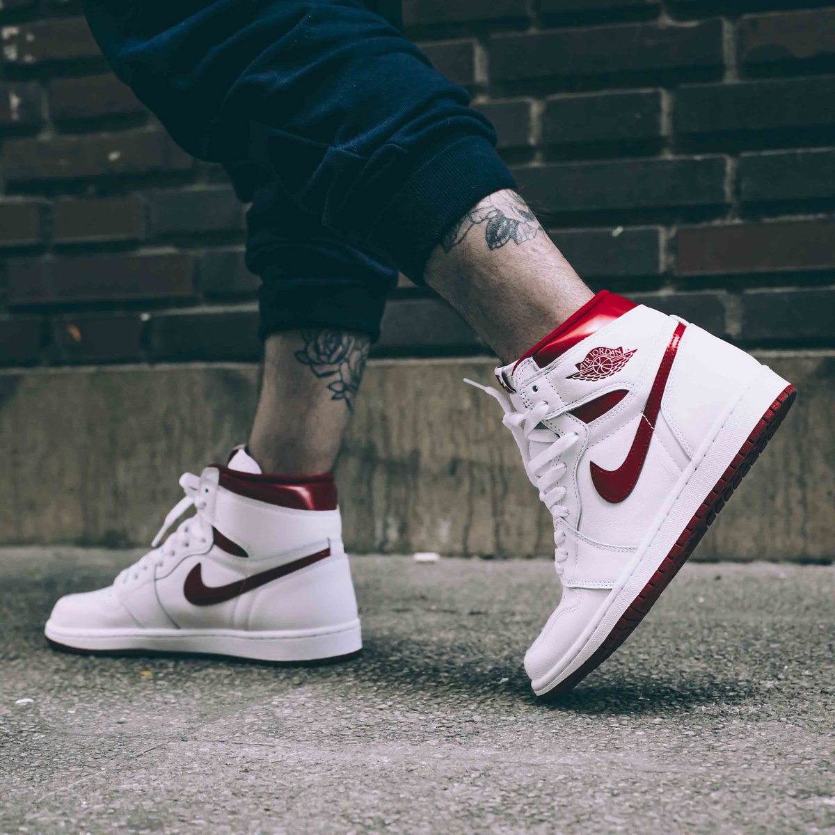 jordan 1 metallic red on feet