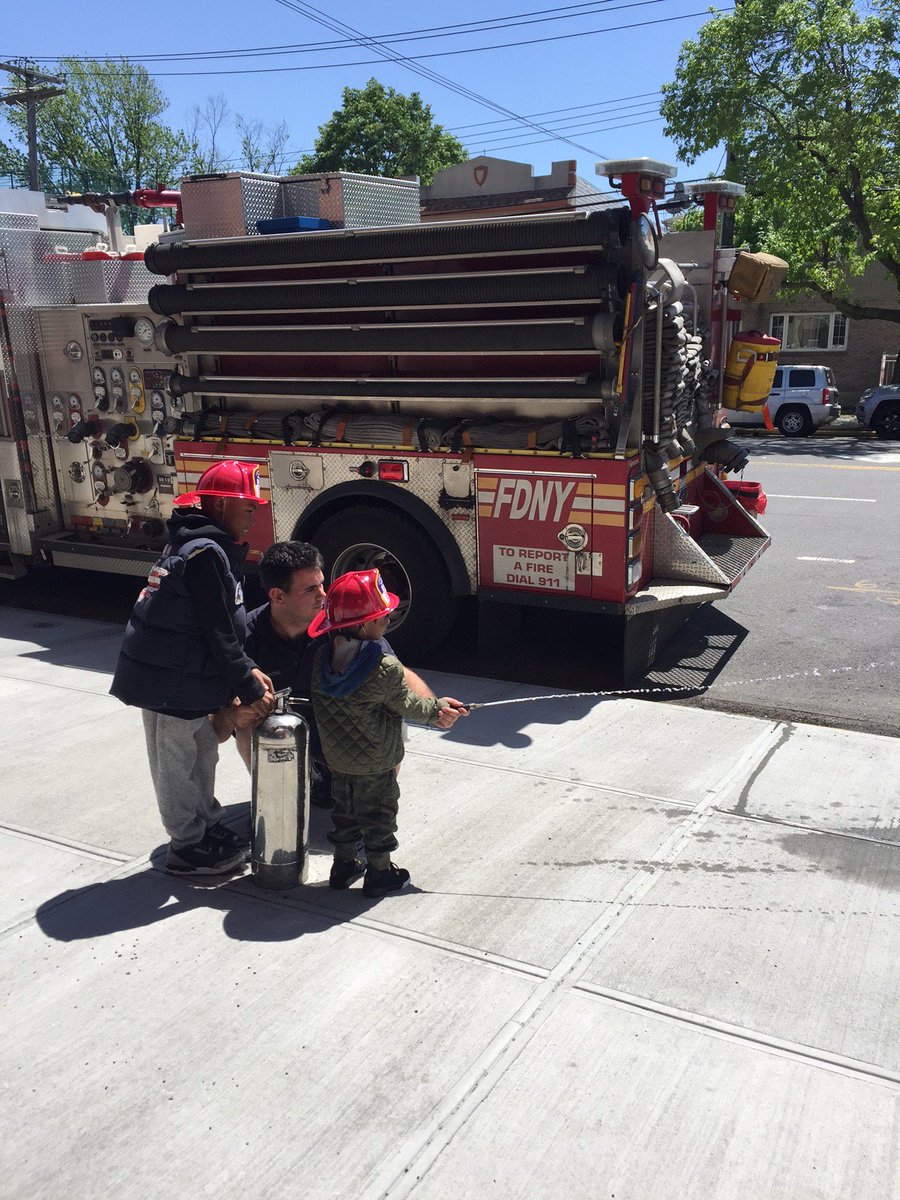 FDNY's tweet photo. #FDNY FF Tarantini trains the next generation of Firefighters at #Ladder155 in #Queens #FDNYOpenHouse https://t.co/Eh3fTg3PX1