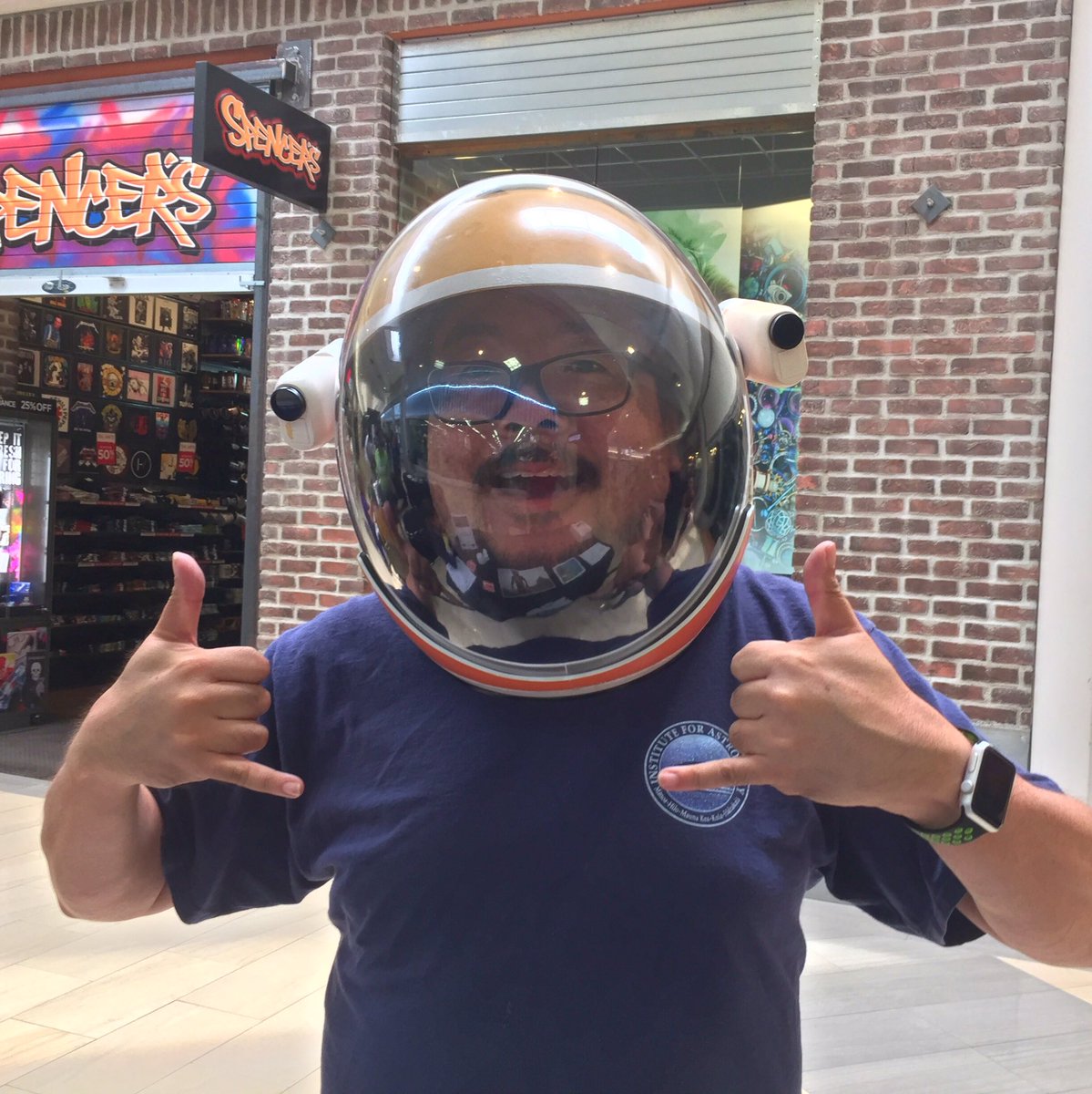 MartianHelmet's tweet photo. The #MartianHelmet is back!  Visit the @HI_SEAS table at the Hilo #AstroDay 2017 today. Here's @Hawaii of trying it on for size. https://t.co/Gp0ZFxCS9r