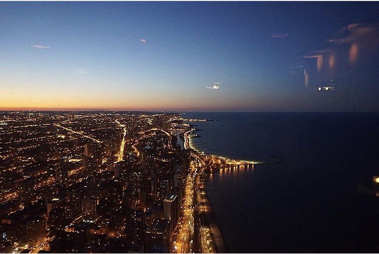 Sunset over Chicago.  Photo by @abigailcoultrup. #signatureroom #sunset #chicago