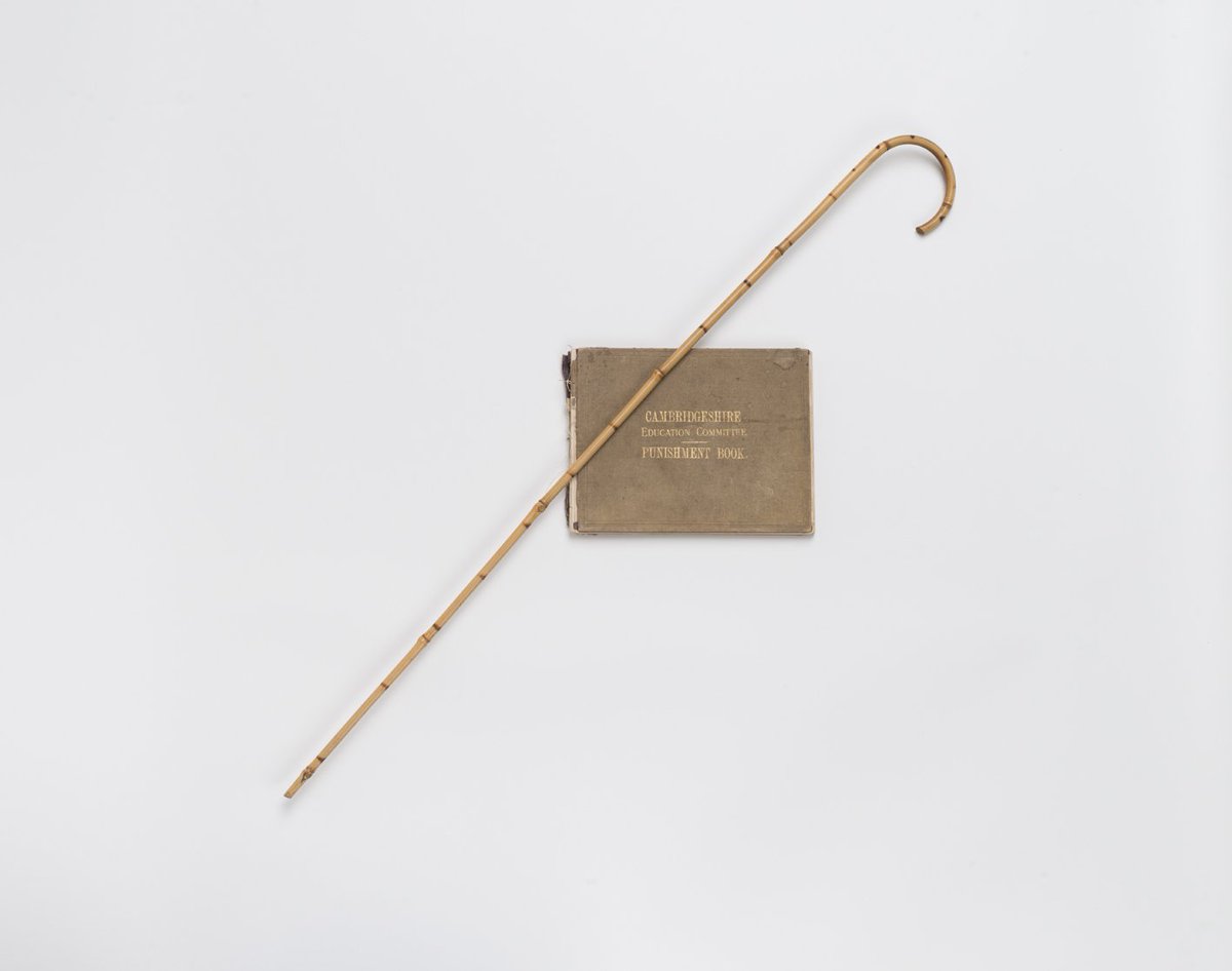 pinkfloyd's tweet photo. The punishment book and cane used on Roger Waters when he was at school, at the PF Exhibition #TheirMortalRemains https://t.co/YpkeoD9HO5 https://t.co/L8PNXuX6Kg