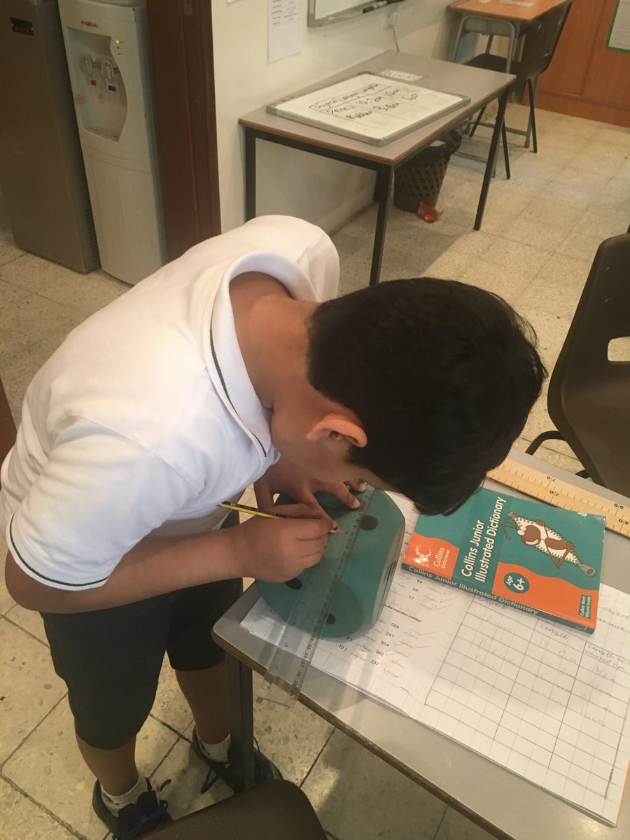 KESBreakingNews's tweet photo. GJV have been measuring objects in class and rounding them to the nearest centimetre. #KESGU https://t.co/bQJ54Pclsl