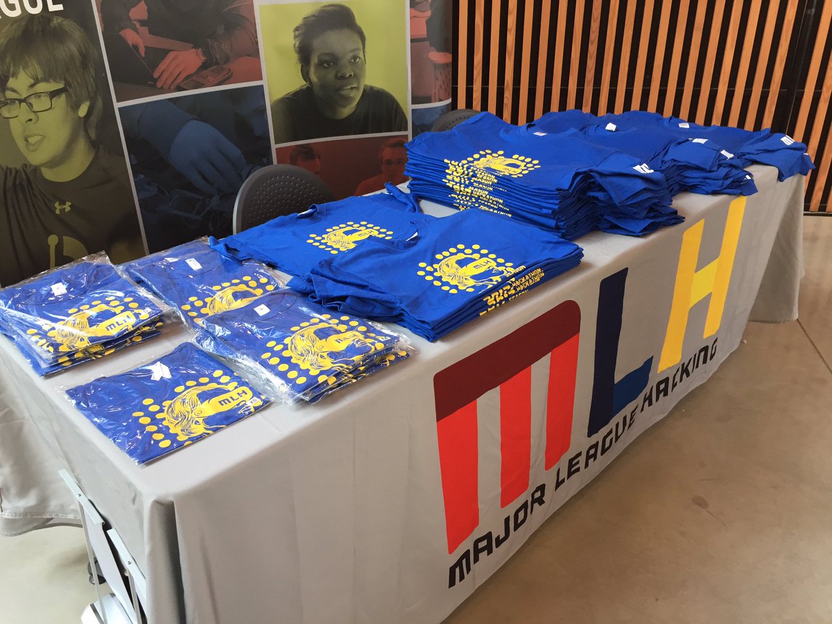 MLHacks's tweet photo. Come and swing by the MLH booth at #hackbdx to grab your season shirt courtesy of @CapitalOne https://t.co/WeJLc4BpPr