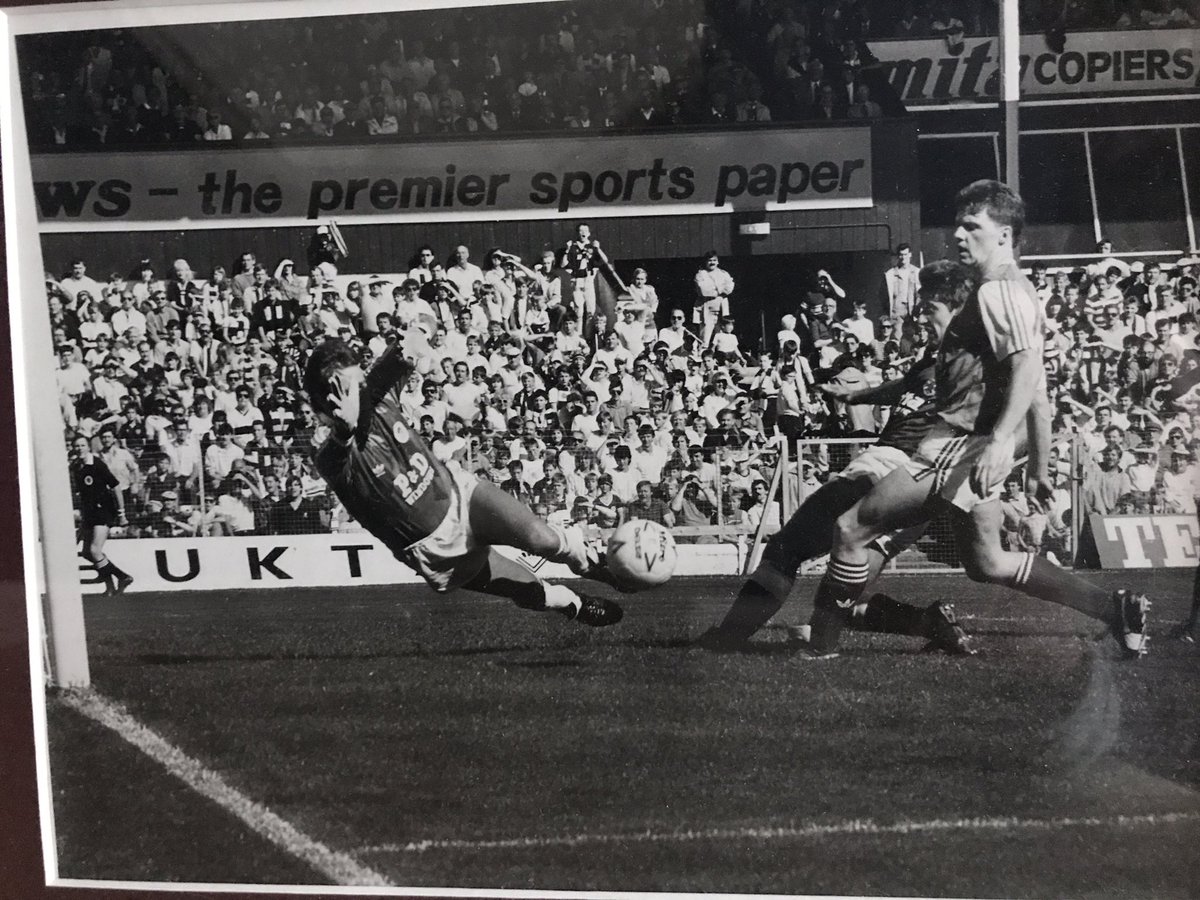 Leisham38's tweet photo. Last day of the old stand, my Dad and I watching Robbo score against Hibs late 80's. Great, photo, great memories @JamTarts #oldstand https://t.co/MgBMx2N9Kb