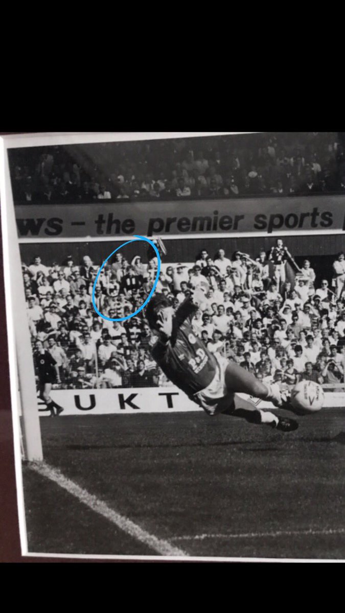 Leisham38's tweet photo. Last day of the old stand, my Dad and I watching Robbo score against Hibs late 80's. Great, photo, great memories @JamTarts #oldstand https://t.co/MgBMx2N9Kb