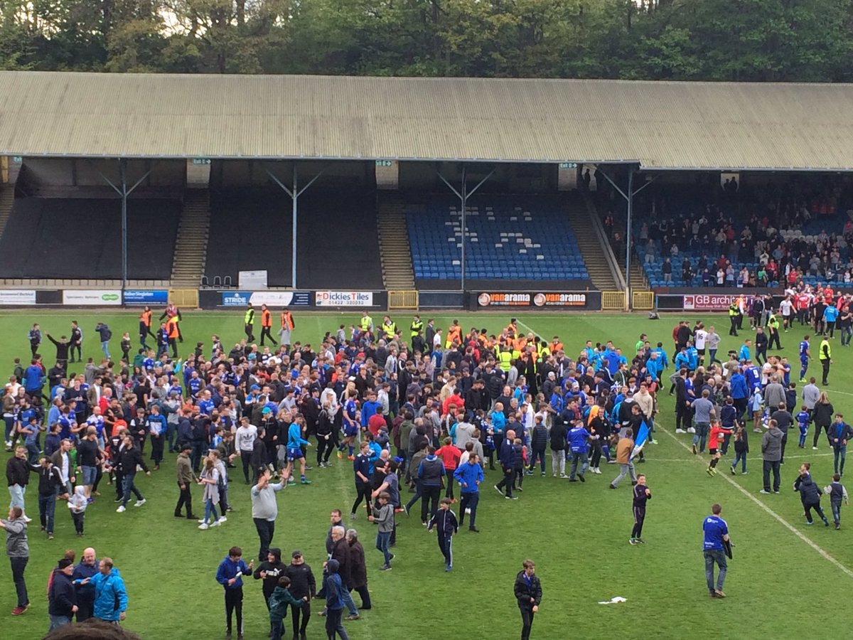 Pitch invasion at The Shay after <a href="/FCHTOnline/">FC Halifax Town</a> make the National League North promotion final after beating Salford City on penalties