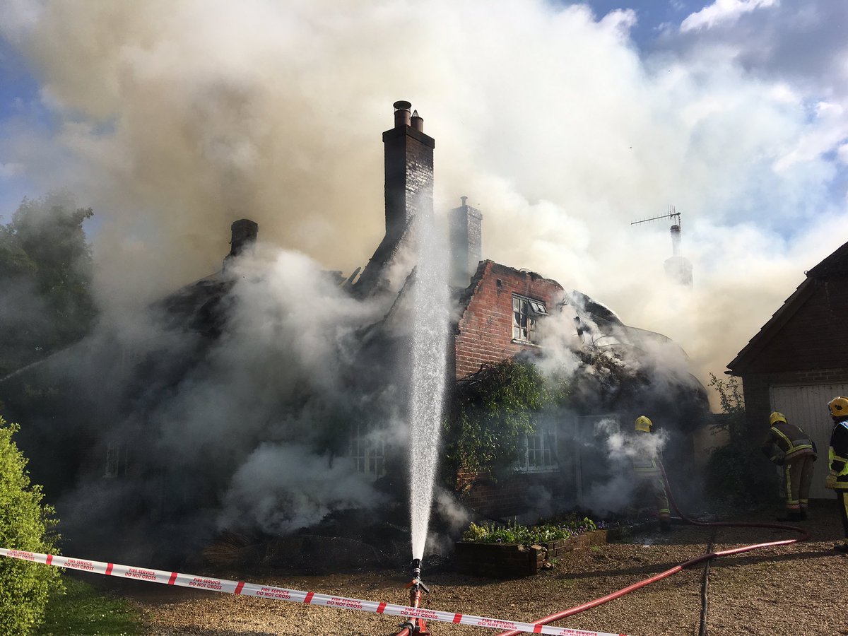 PICTURES 80 firefighters tackle blaze at thatched cottage in Hampshire