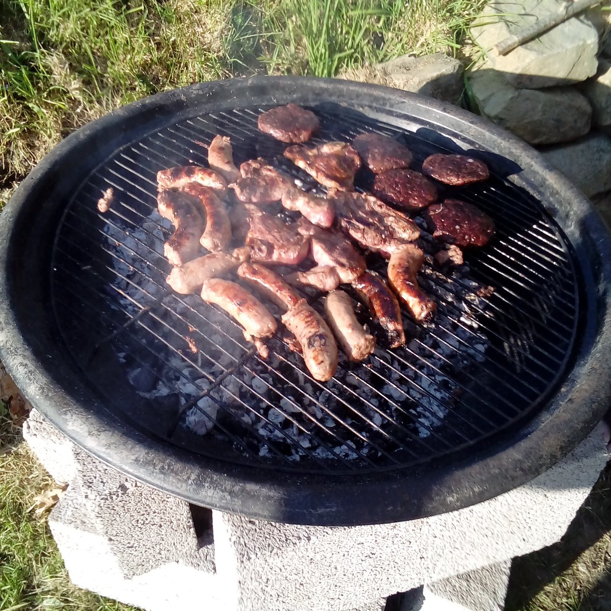 CaeMain's tweet photo. First barbecue. Local organic lamb and sausages. Mmmmmm. https://t.co/07eGRXD11q