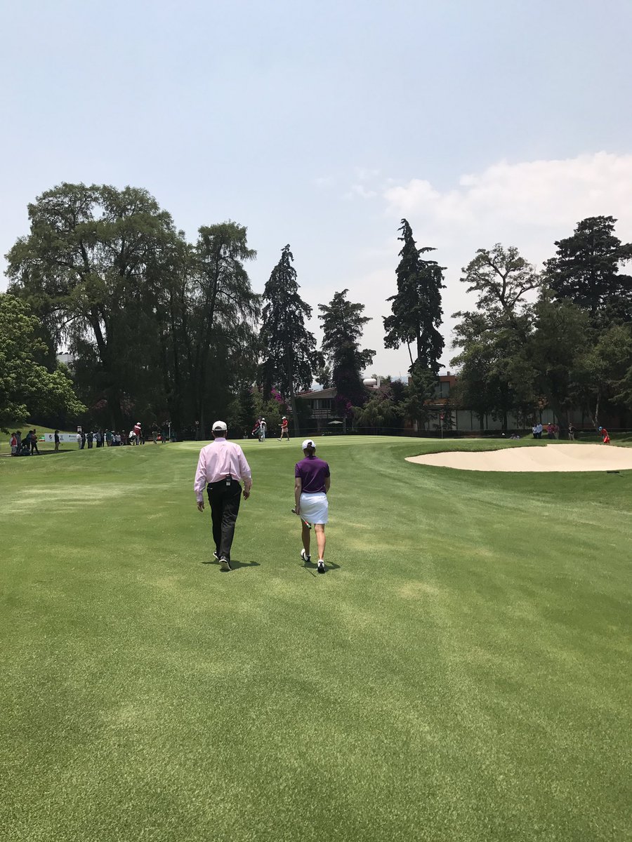 LPGA's tweet photo. HOF match: Lorena Ochoa has a friendly chat with LPGA rules official Marty Robinson as they walk up the 10th fairway. #LOYCDMX #LOYHOF https://t.co/KxwhTFnPAV