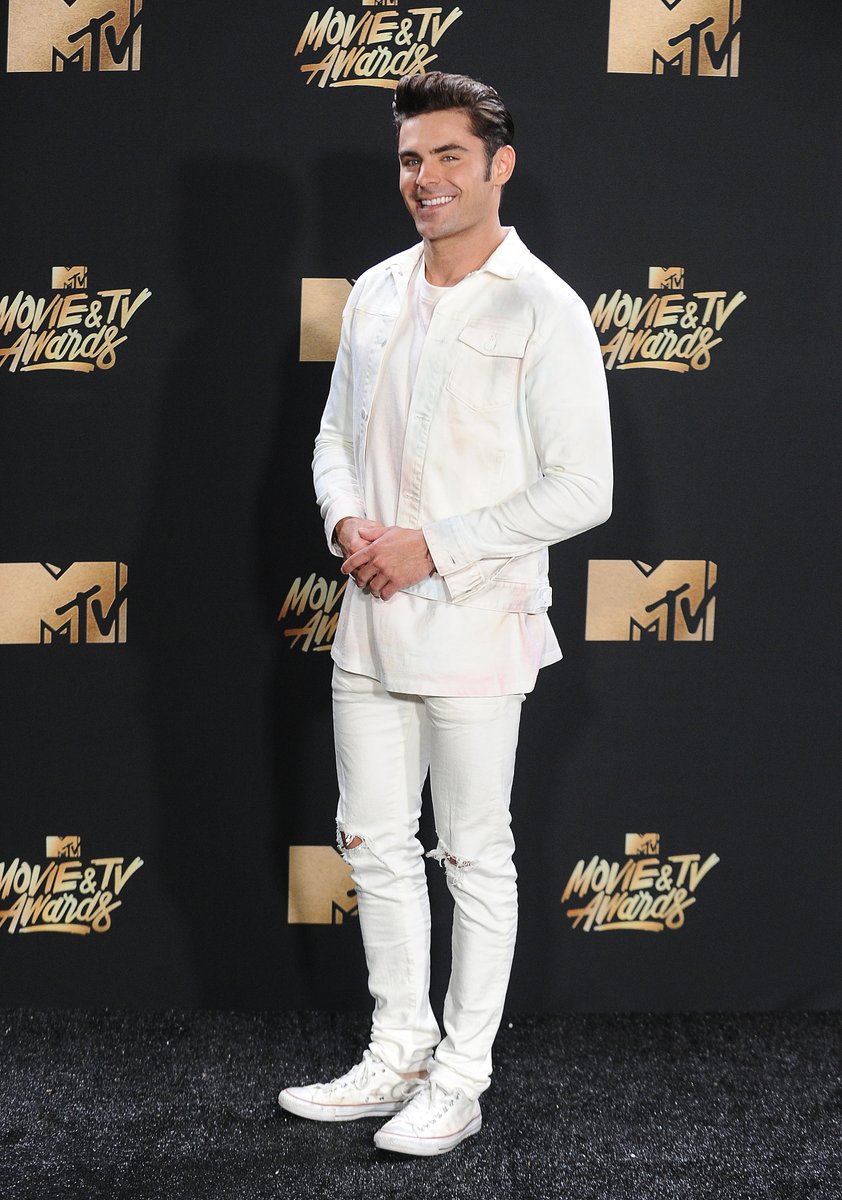 MTV's tweet image. Don&apos;t mind me... Just sitting here swooning over @ZacEfron at the #MTVAwards.