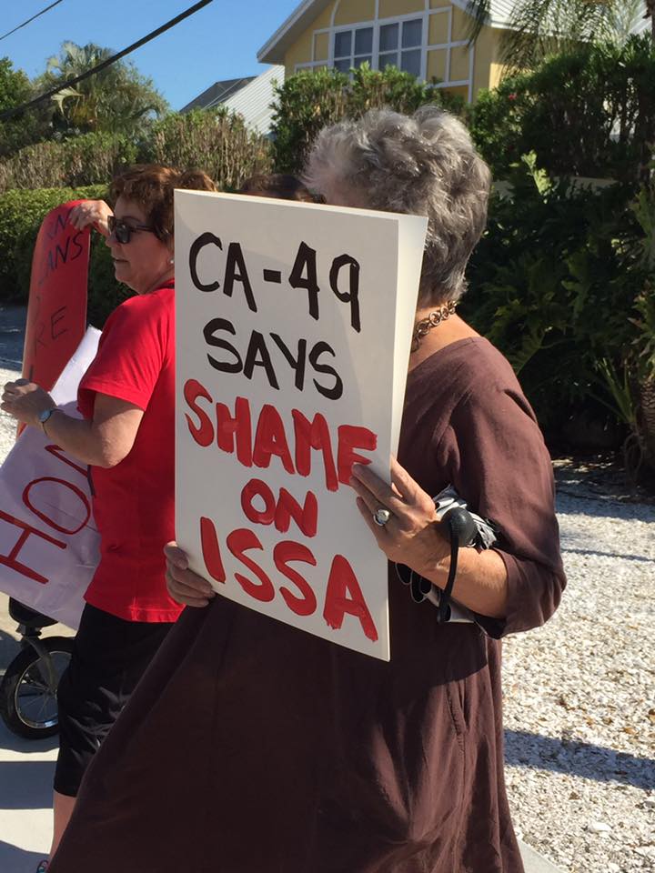 indivisible_brd's tweet photo. We surrounded the @marcorubio & @VernBuchanan fundraiser for @DarrellIssa on land & water, with our boater activist brigade @SDIndivisible https://t.co/hToBQroWCs