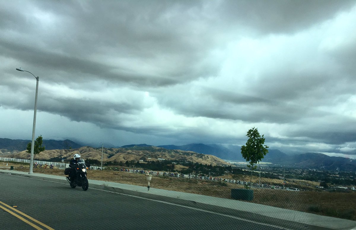 redlandsClassic's tweet image. Threatening clouds are looming overhead as riders hit #11togo. 3 riders off the front - @UHCprocycling @Rally_Cycling &amp;amp; @GHDcycling