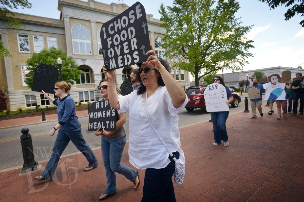 NWADemGazPhotos's tweet photo. A 'Die-In for ACA' was hosted today by @OZRKIndivisible on the #Bentonville square. More: https://t.co/OFwSzbo1Qq #DieInAR #ACA https://t.co/Y1RMnKuYaq