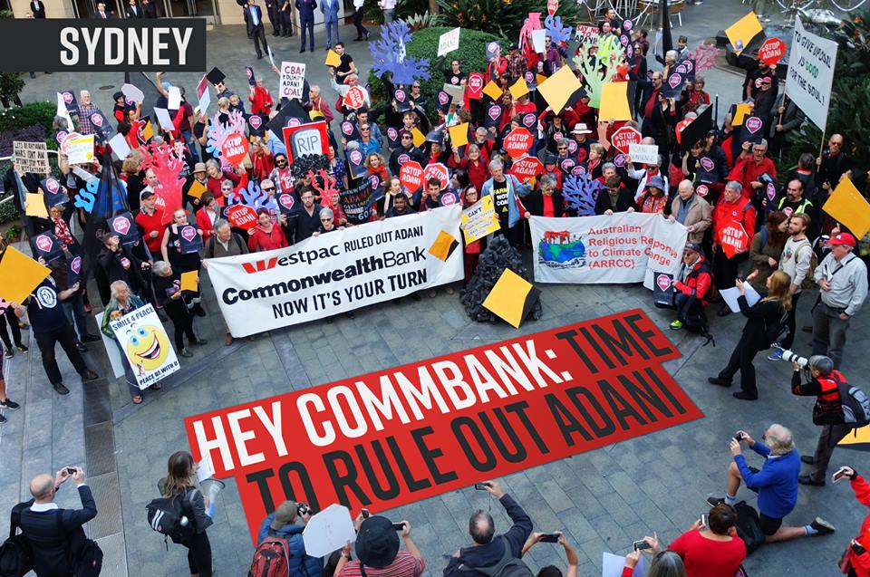 stopadani's tweet photo. Today 200+ people rallied outside @CommBank HQ in Sydney demanding CBA cut their ties with Adani &amp; put #ClimateAction 1st. #StopAdani https://t.co/MVZ6abqPa4