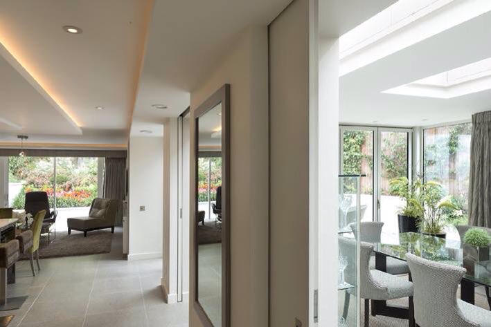 Internal hidden sliding doors allow the spaces to be opened up or closed off by Seary Architects. #architecture
