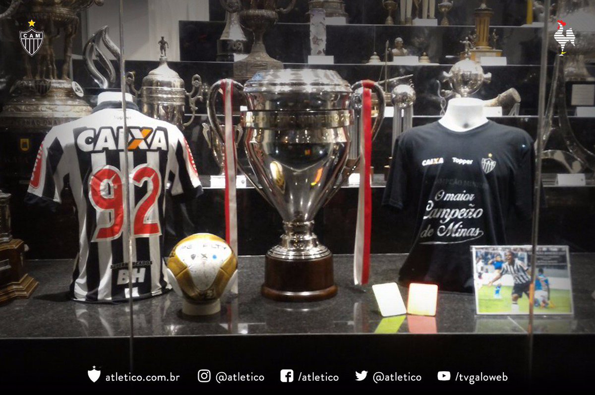 Atletico's tweet photo. Tem camisas, bola, cartão e, claro, a taça! Venha visitar nosso memorial na Sede de Lourdes. Aberto 24h. Aqui é #Galo! 🐔#ChoraMenosJogaMais https://t.co/bKBmjgXrdn