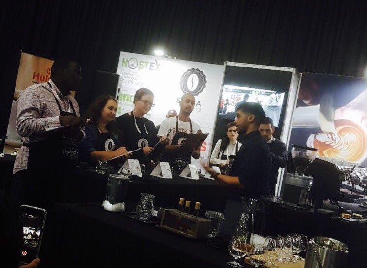 OriginCoffeeSA's tweet photo. Now up, Winston is going through his set. Competitors prepare 3 rounds which end with a speciality drink of their own creation #hostex2017 https://t.co/KAdo9xJDDa