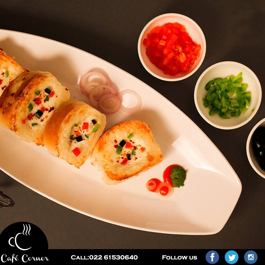 cafecornermum's tweet photo. Forget the world while you enjoy this scrumptious melted cheese garlic bread. Mouth-watering, isn't it? #CafeCorner #SantaCruz #Foodie https://t.co/DZhMrNZcfT