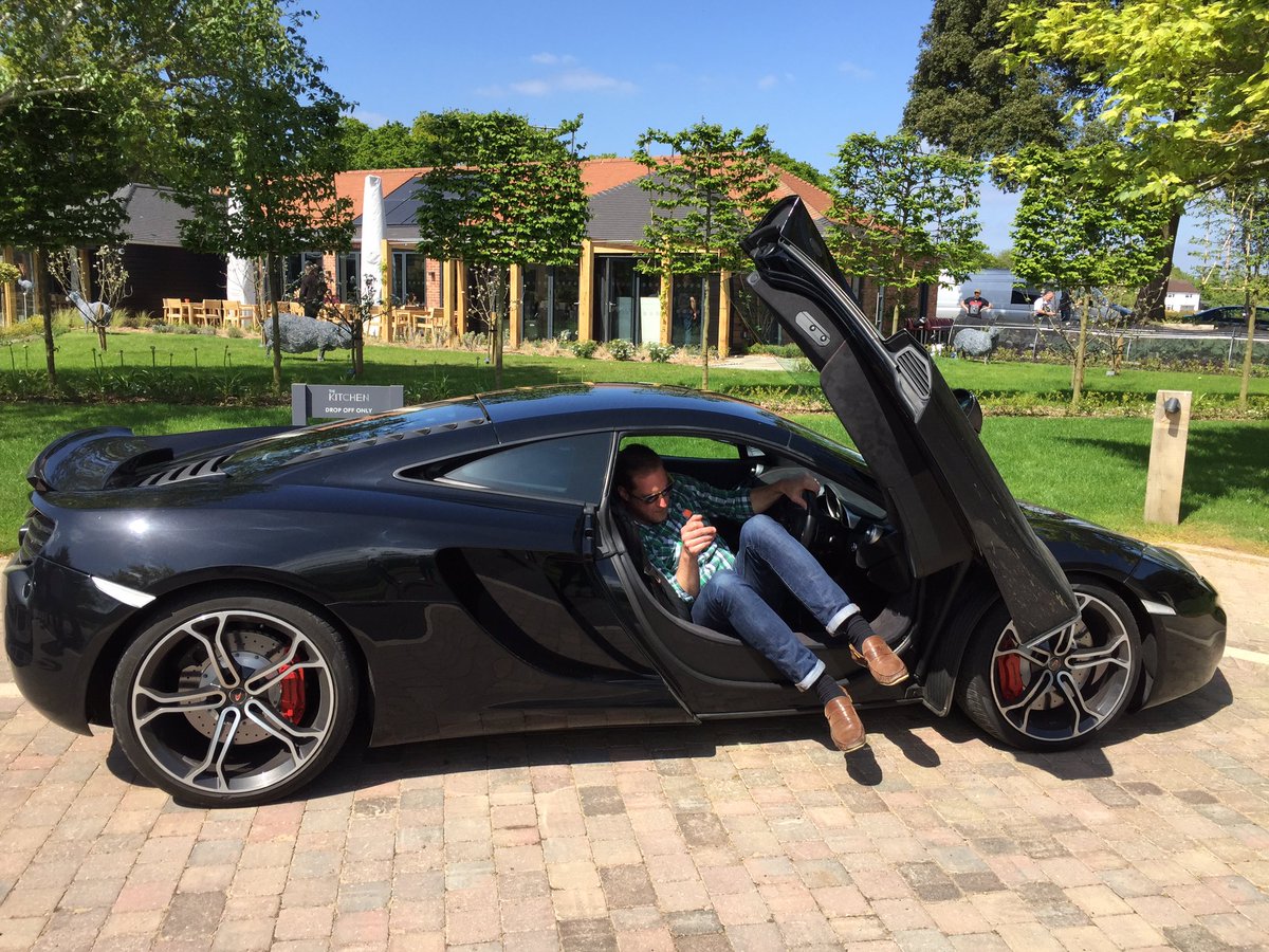 Andy_Dingaling's tweet photo. Top tip: How not to get in a #McLaren if you're 6'4"...Especially at the achingly cool @TheKitchenatCG #FoodandFuel @jamesmartinchef https://t.co/aYKXWAy9rT