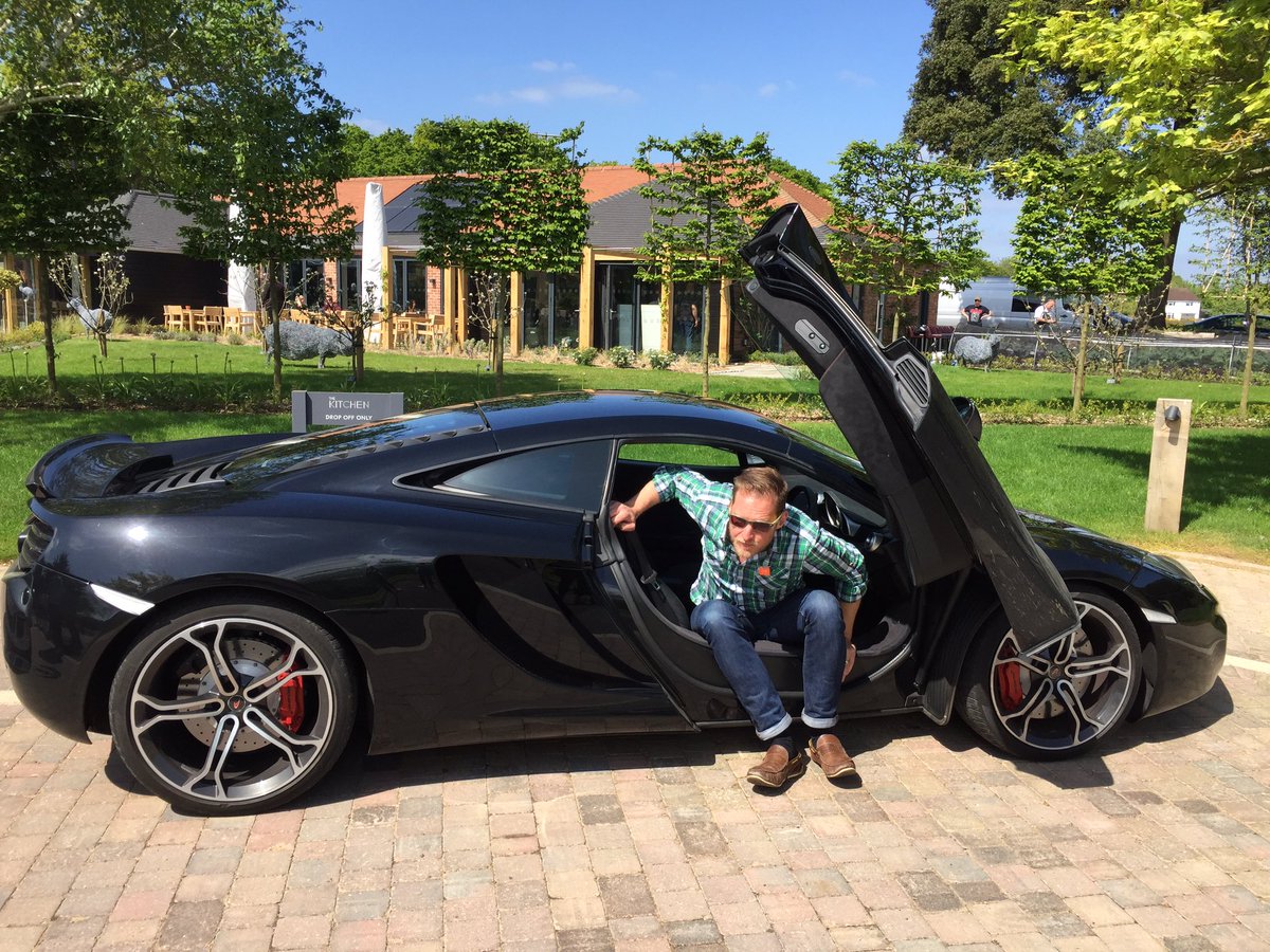 Andy_Dingaling's tweet photo. Top tip: How not to get in a #McLaren if you're 6'4"...Especially at the achingly cool @TheKitchenatCG #FoodandFuel @jamesmartinchef https://t.co/aYKXWAy9rT