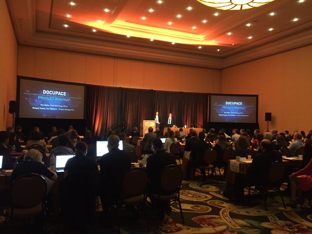 Dana_Taormina's tweet photo. Richard Thoeny and Ron Wallis taking the crowd through @docupace 's product roadmap here at #DocupaceVision2017 https://t.co/H0NxHAq9nz