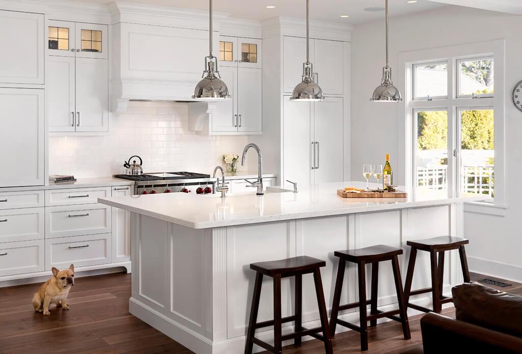 Great little #oakbay #kitchen we wrapped up last fall! #kitchendesign #interiordesign #frenchbulldog #whitekitchen #thomasphilipswoodworking