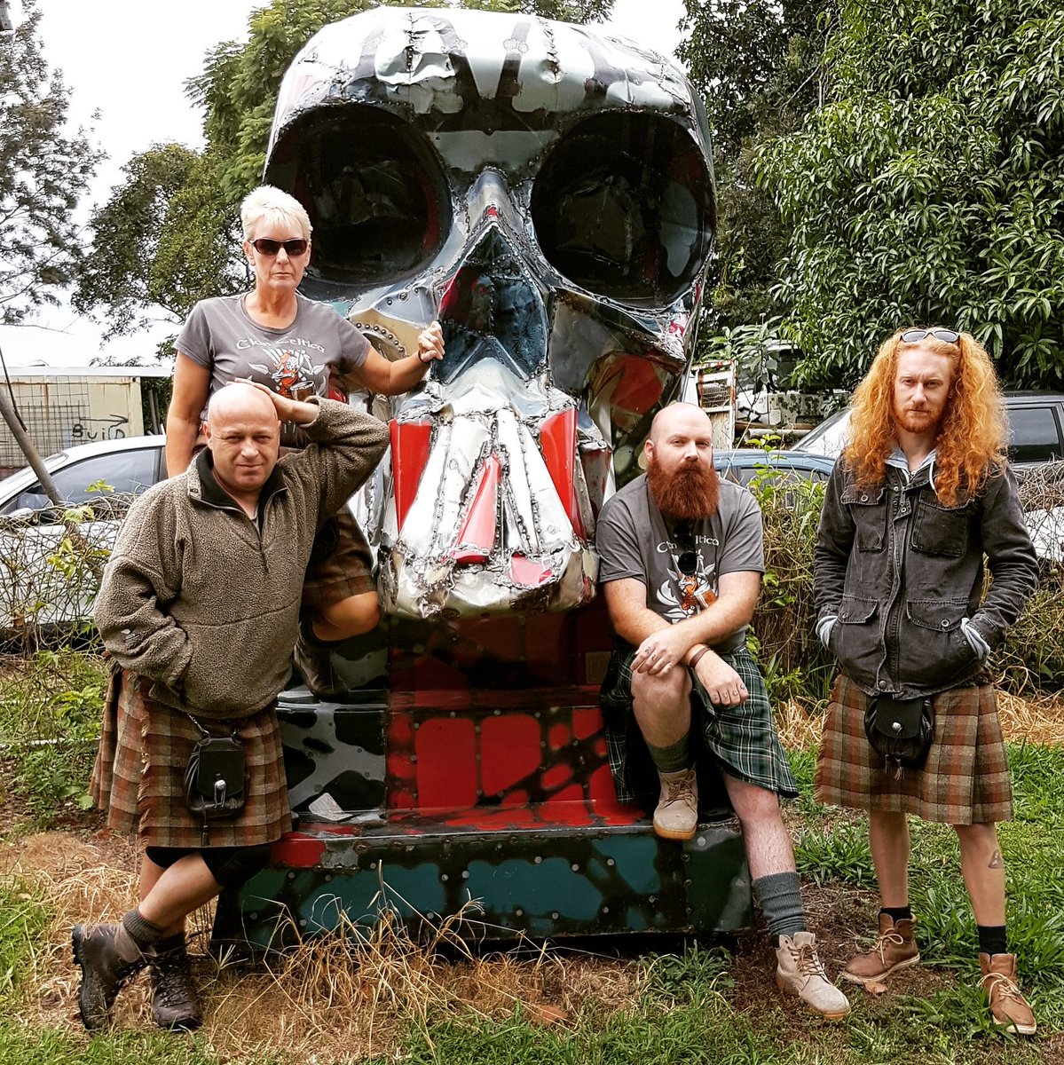ClanCeltica's tweet photo. Over it, let's go home... here's us in front of a big metal skull. See yas next time Aussie! #clanceltica #australiancelticfestival #kilts https://t.co/cpqneQcRv8