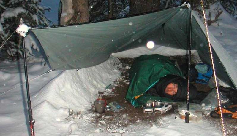 Quilts work! Waiting out a 3-day blizzard, 15 F night under a tarp in a one pound quilt. I walked out warm &amp; happy goo.gl/bC2kHd