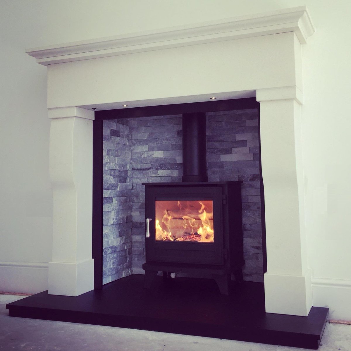 The Chateau Fireplace in Ivory white limestone made by <a href="/FindleyHouse/">Findley House</a>, fitted by <a href="/ELBFireplaces/">ELB Fireplaces</a> . Fantastic job Leon, it looks stunning