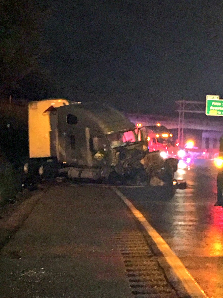 Local12Perry's tweet photo. It looks like the semi hit the median & bounced into the overpass causing it to lose packages all over the hwy. #NB75 #downto1lane #gridlock https://t.co/R45d0bR59B