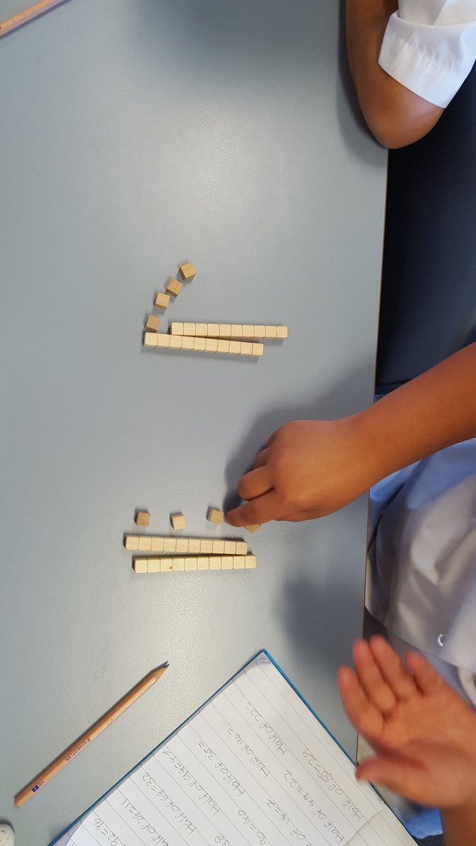mazuohk's tweet photo. Finding half of 2 digit numbers using base 10. Math champs! @Sherwood_Grange #2K2017 https://t.co/AXGp9gW1rs